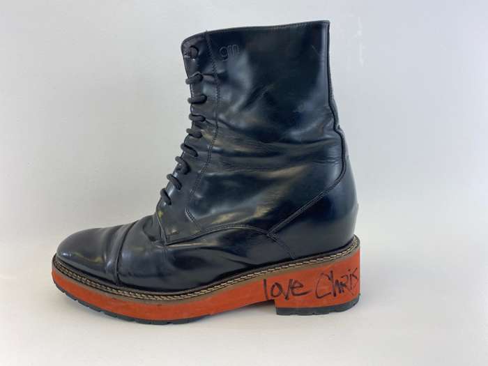 Chris’ Stage Boot (left) - signed by Chris - IAMX