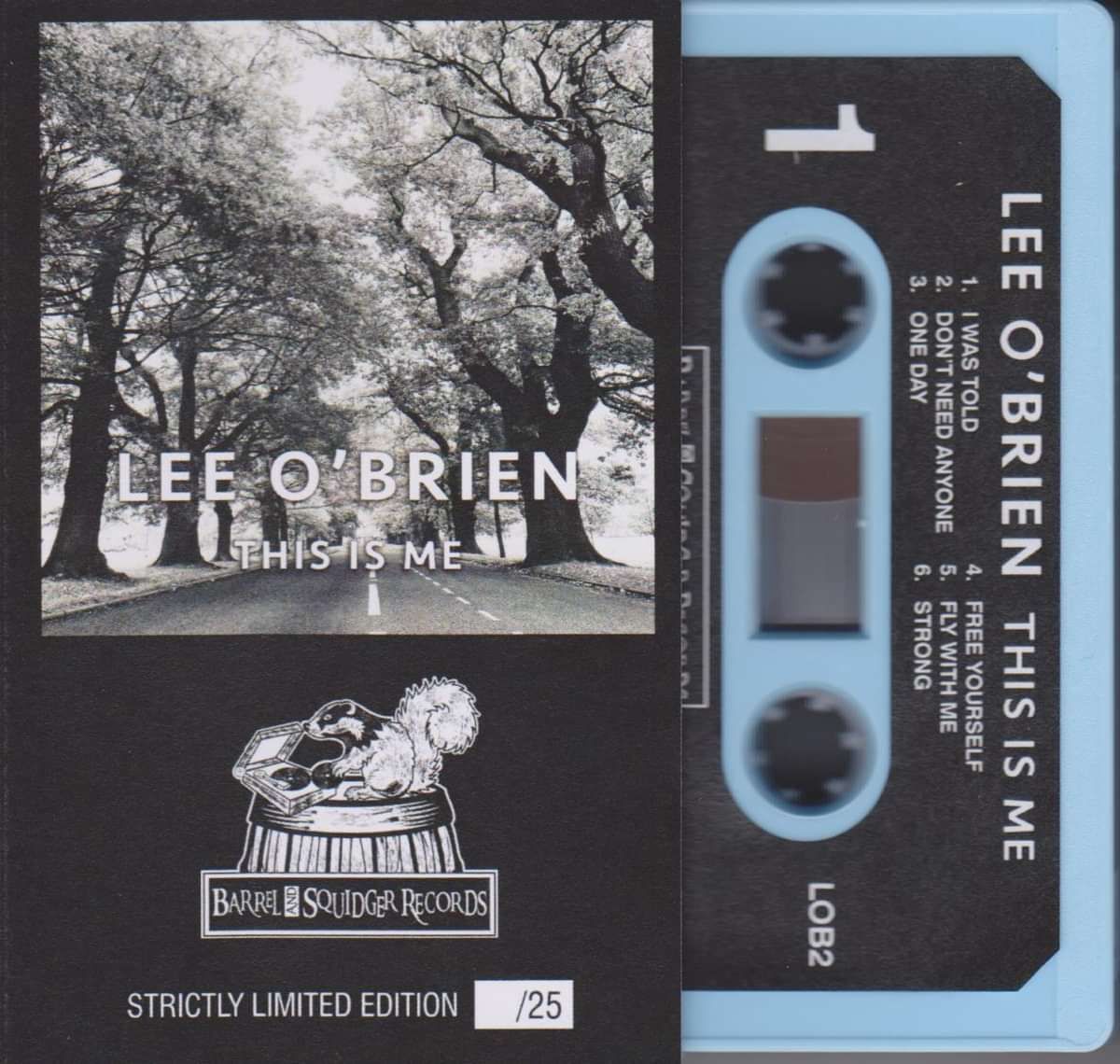 Lee O'Brien - This Is Me - Blue Cassette [Recorded with Status Quo's Francis Rossi] - Barrel And Squidger Records