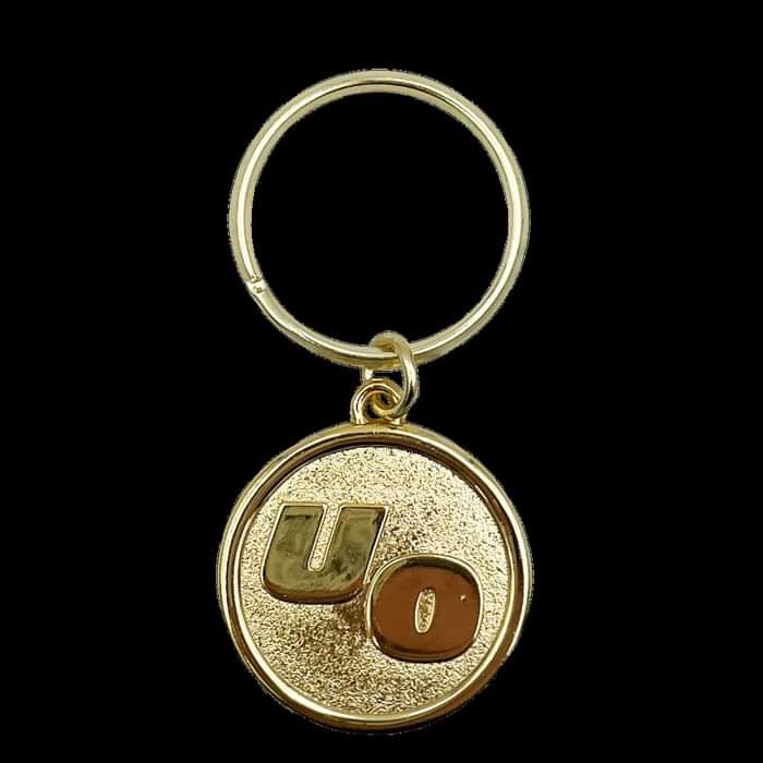 UO Gold Keychain - Urge Overkill